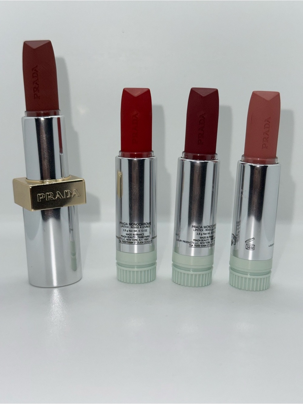 Prada Lipstick Quartet — Classic Red, True Red, Deep Burgundy, Soft Nude